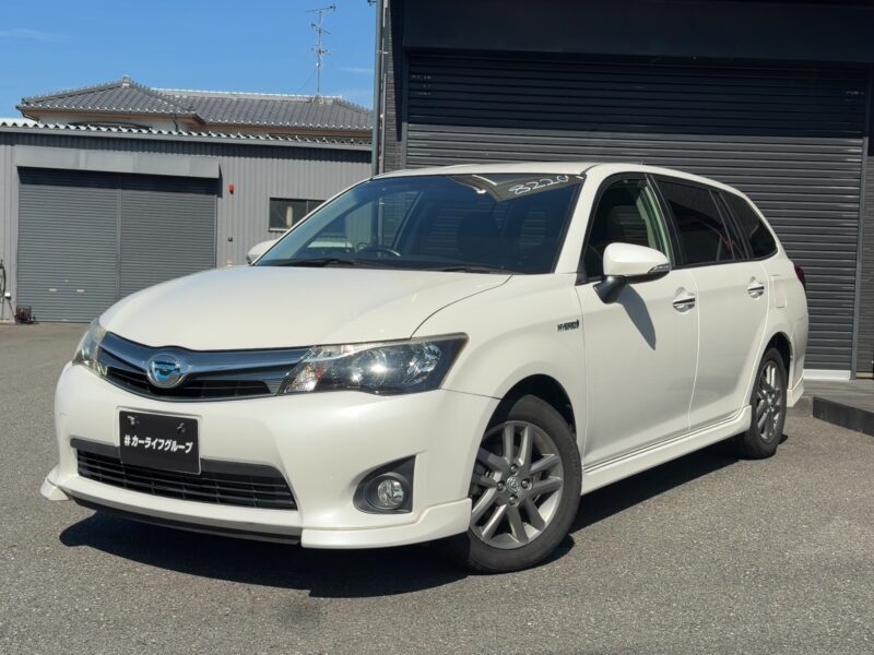 トヨタ カローラフィールダー ハイブリッドGエアロツアラーW×B【総合評価優良車】